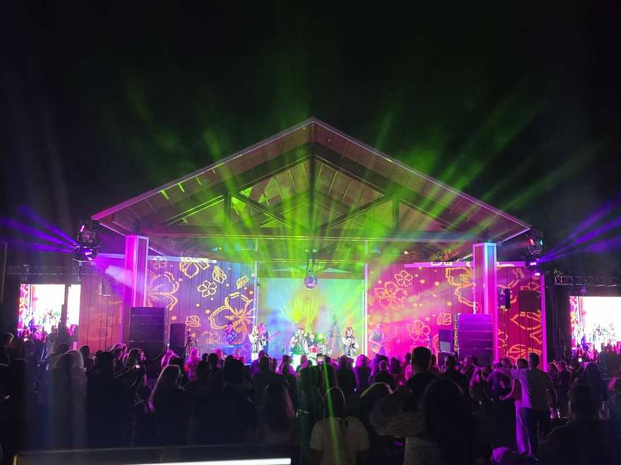 Full festival production running: lighting, lasers and video on one stage